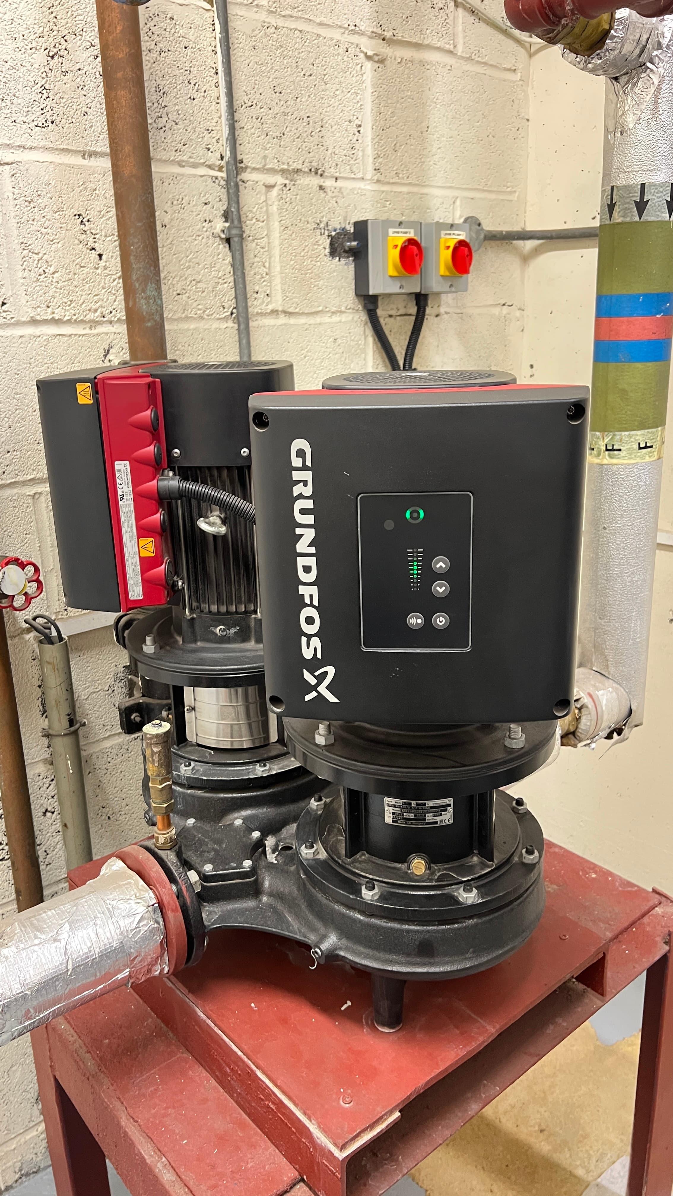 Grundfos X variable speed pump unit on red stand
