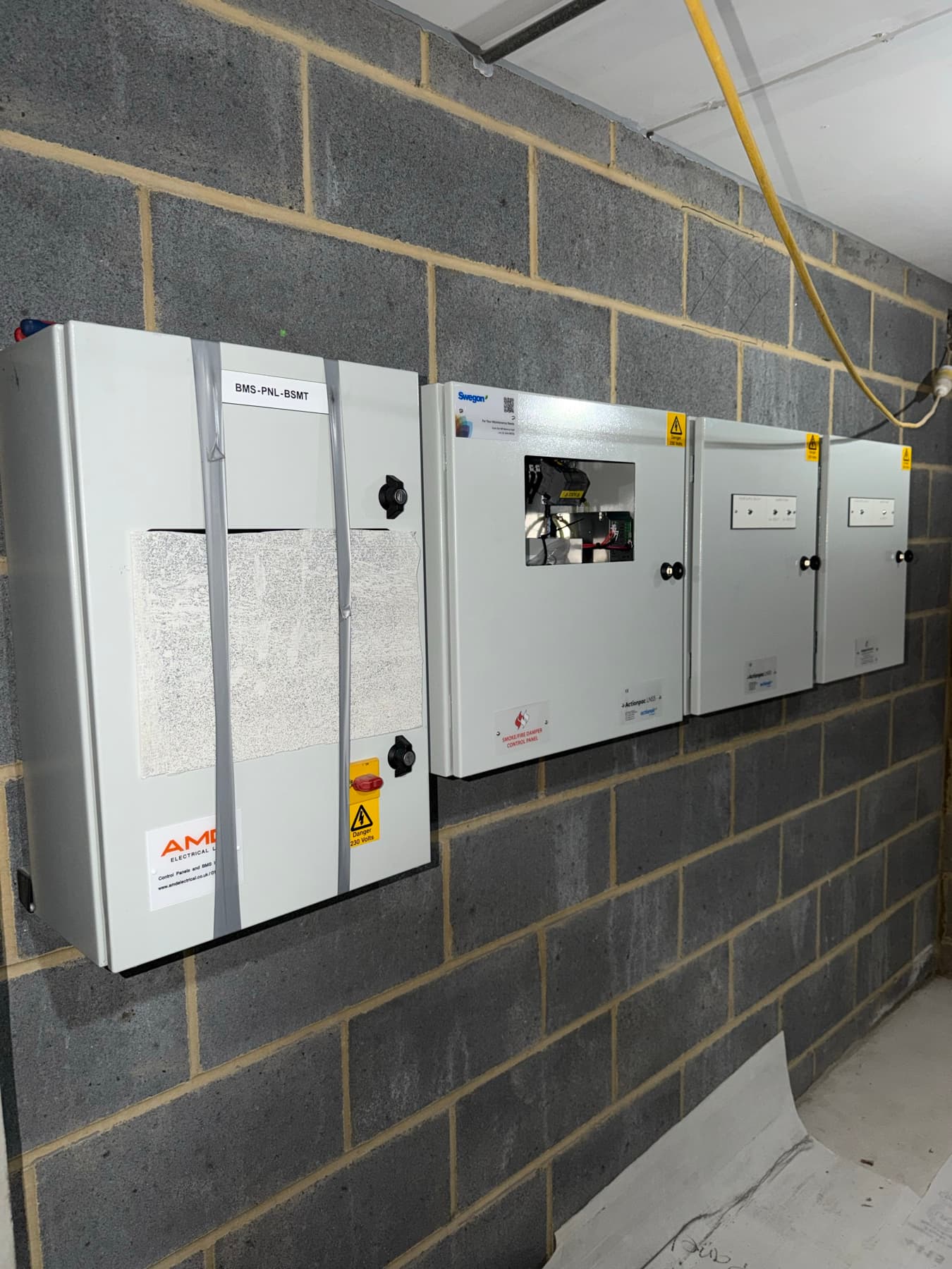 Three MSFD control panels and the BMS panel in the basement plant room
