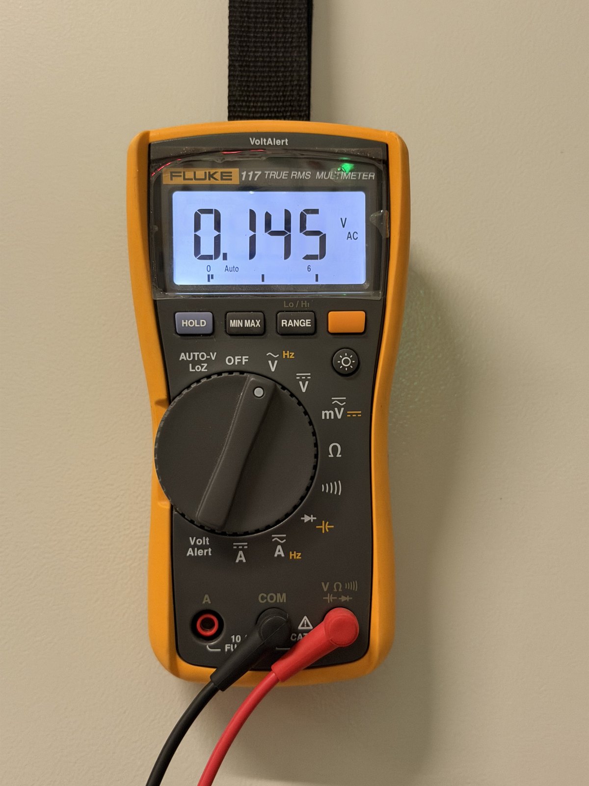 Multimeter reading 0.145 volts AC at a BMS control transformer primary