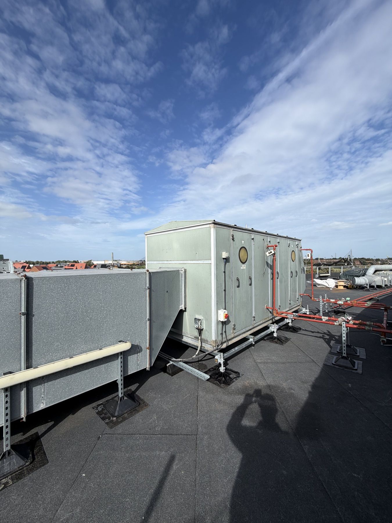 Air handling unit reinstated on the new roof at Royal Harbour Academy with control cabling re-terminated