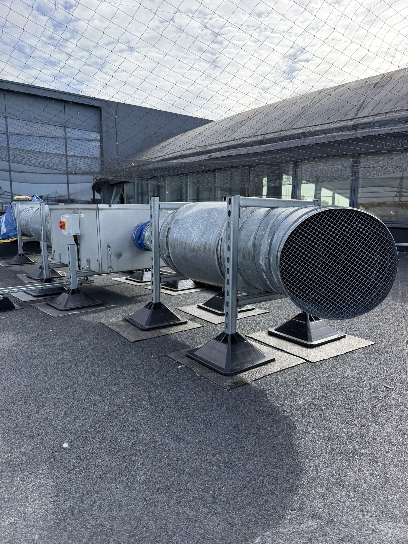 Extract fan reinstated on the new roof at Royal Harbour Academy