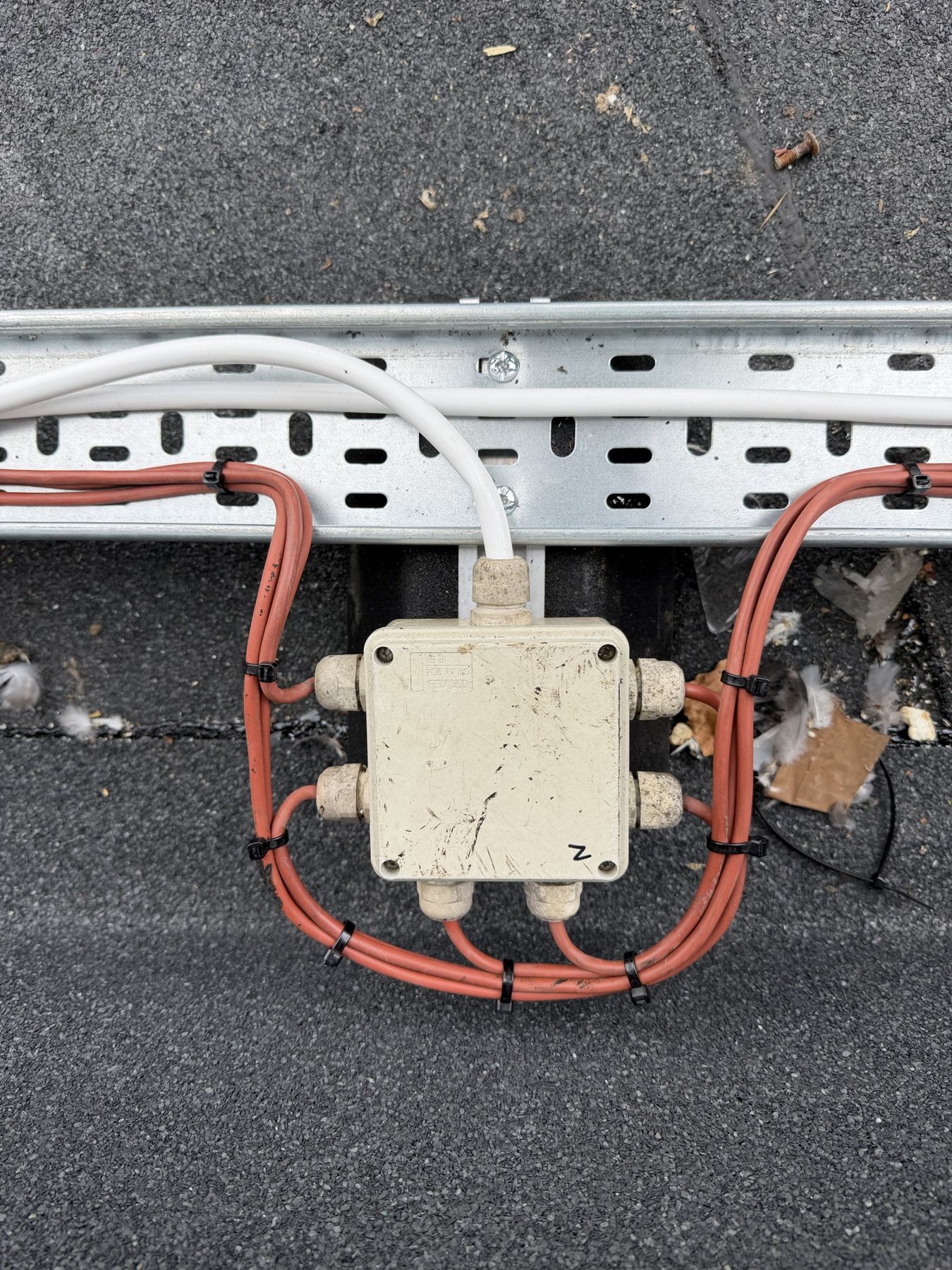 Roof junction box feeding a group of 24V window actuators from the new cable tray
