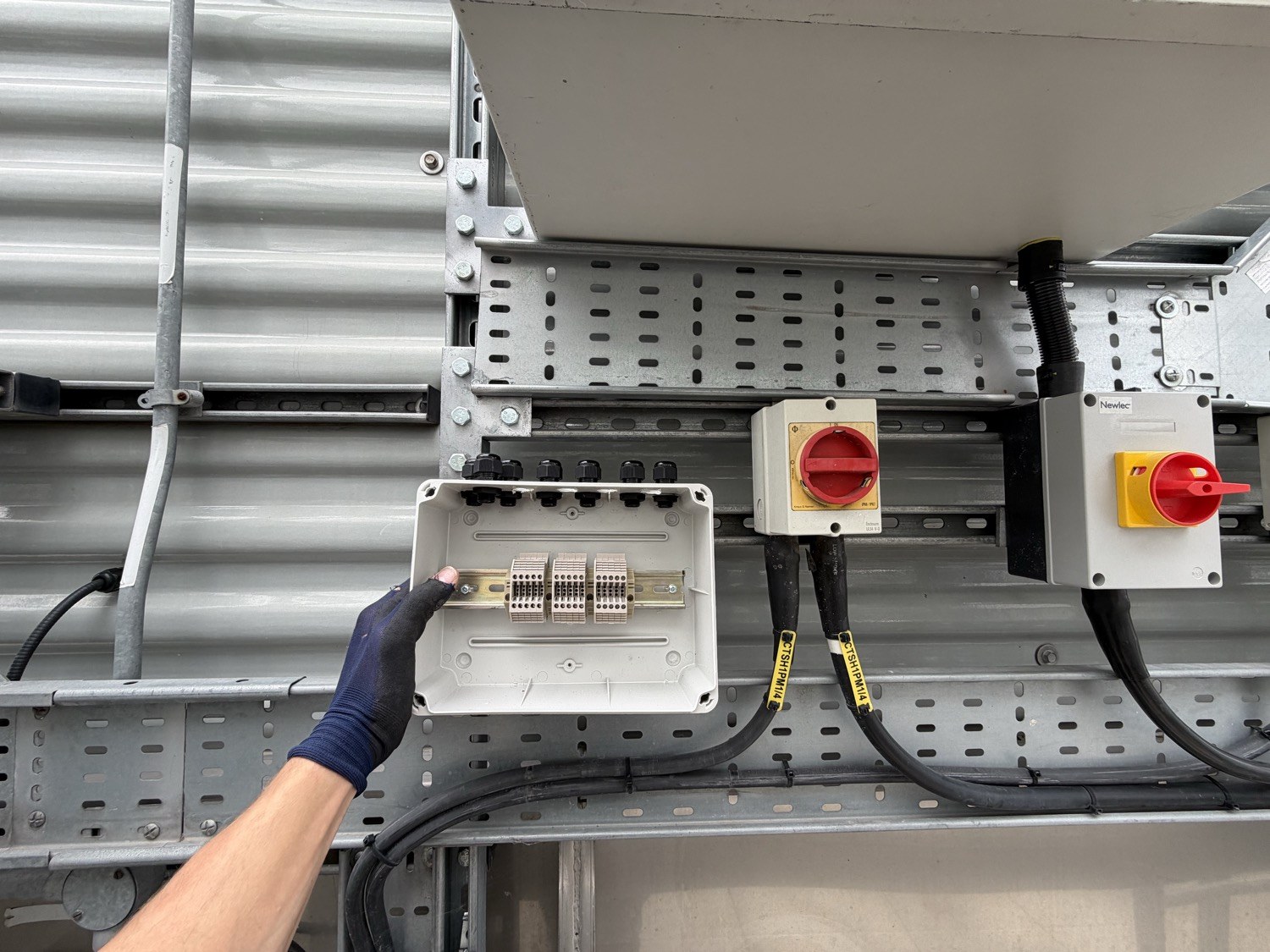 Data centre BMS integration — segregated network enclosure and isolators on dedicated rooftop containment